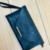 Bolso de mano con broche dorado - Imagen 8